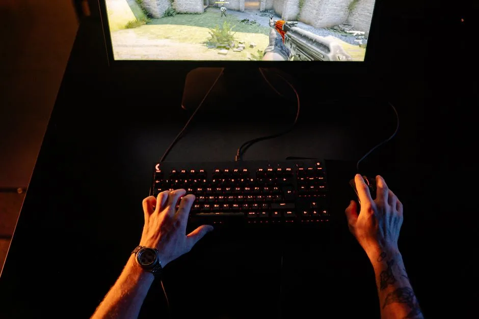 A person comparing notes at a gaming desk