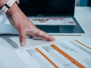 Person checking subscription usage information on a laptop