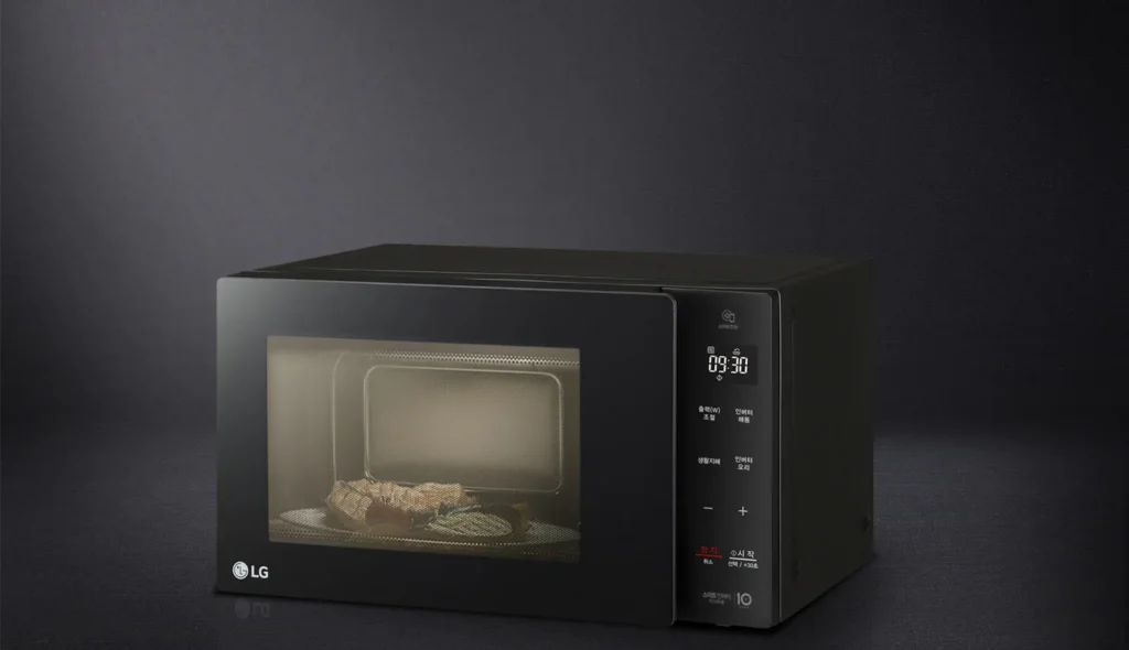 LG MW23BD의 전면 표시창과 출력·해동·시간 조절 버튼
