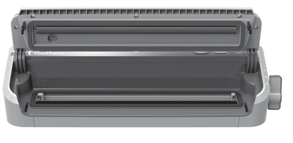 FoodSaver FM2000의 열린 뚜껑과 위아래 패킹, 진공채널 위치