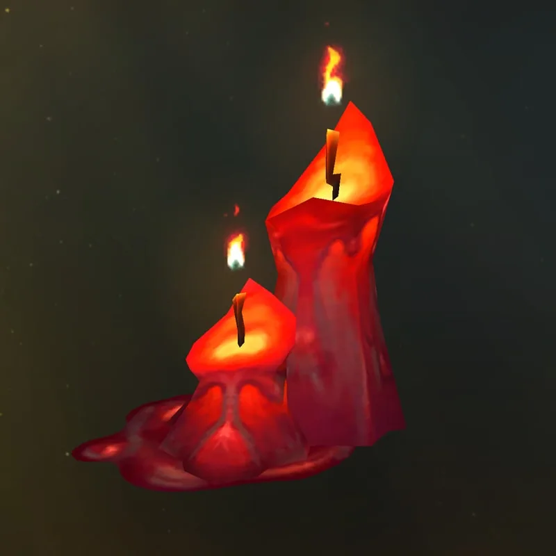불이 붙어 있는 붉은 Sintallow Candles 장식 두 개